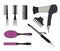 Hair dryer, a curling iron and different types of hair brushes on a white background