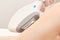 Hair laser removal service. IPL cosmetology device. Professional apparatus. Woman soft skin care