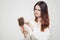 hair loss health problems woman with a comb in her hand on a light background