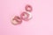 Hair spiral scrunchies on pink background