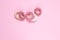 Hair spiral scrunchies on pink background