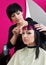 Hair stylist making cool haircut