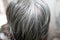 Hair is turning grey in an old human. hair turns grey - close up shot