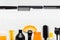 Hairbrush, comb, scissors, shampo. Orange black set. Hairdresser tools, hair salon equipment for professional hairdressing in