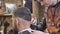 Haircut men Barbershop. Men\'s Hairdressers; barbers. Barber cuts the client machine for haircuts.