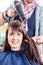 Hairdresser blow dry woman hair