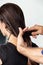 Hairdresser Combing Client\'s Wet Hair