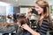 Hairdresser Cutting Client\'s Hair