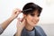 Hairdresser doing Hairstyle. Brunette with Short Hair in Salon