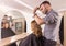 Hairdresser mirror cutting hair sideview