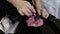 Hairdresser Mixing Hair Dye In Bowl In Hair Salon