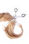 Hairdresser\'s scissors with strand of blond hair on white background