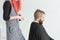 Hairdresser, stylist and barber shop concept - woman hairstylist cutting a man