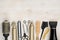 Hairdressing tools on wooden background with copy space at top