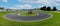 Hairpin bend turn in motorsport asphalt circuit scenic wide panoramic view