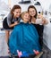 Hairstylists and female customer taking selfie