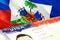 Haiti immigration document close up. Passport visa on Haiti flag. Haiti visitor visa in passport,3D rendering. Haiti multi