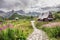 Hala Gasienicowa in Tatra Mountains. Alpine style landscape in the summer. Wooden houses on a meadow with flowers