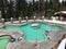 HALCYON HOT SPRINGS, BRITISH COLUMBIA/ CANADA - DECEMBER 26, 2016: People relaxing in 37 degrees Celsius mineral pool.