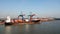 Haldia, India, October, 27, 2020.  Seagoing vessels, tugboats at the port under cargo operations and underway.