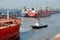 Haldia, India, October, 27, 2020.  Seagoing vessels, tugboats at the port under cargo operations and underway.