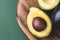 Half of avocado hass.