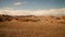 Half blue sky and half desert where sand meets cloud