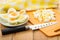 Half of boiled eggs in plate, chopped eggs and knife