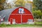 Half Circle Red Barn with Quilt