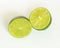 Half cutted lime fruit on white background.