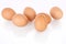 Half dozen brown chicken eggs isolated on white