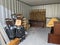 A half empty self storage unit clearance furniture removal