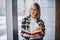 Half length portrait of happy smiling female journalist