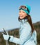 Half-length portrait of woman skier