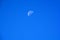 Half Moon During Day in clear Blue Sky, waning moon at daytime a