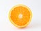 Half nontoxic orange on white background