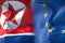 half north korea flag and half European Union flag, crisis european states diplomacy and north korea for nuclear atomic bomb risk