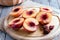 Half peaches on a cutting board