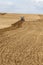 a half plowed agricultural field