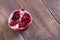 Half pomegranate on table