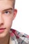 Half portrait of a young man, he is wearing checkered pattern shirt