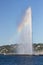 A half rainbow with big fountain in Geneva lake
