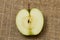 Half small green apple