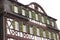 Half-timbered house with green windows Germany