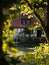 Half-timbered house mill Blautopfhaus at blue turquoise freshwater spring Blautopf in Blaubeuren Baden-Wuerttemberg