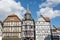 Half timbered houses with blue sky and clouds in the small German town Fritzlar