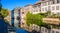 Half-timbered houses reflecting in the canal in the Petite France historic quarter in Strasbourg, France