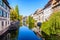 Half-timbered houses reflecting in the canal in the Petite France historic quarter in Strasbourg, France