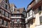 Half-timbered medieval and early Renaissance buildings with window boxes draped with blooms in Colmar.