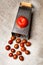 Half tomatoe on a grater and cherry tomatoes